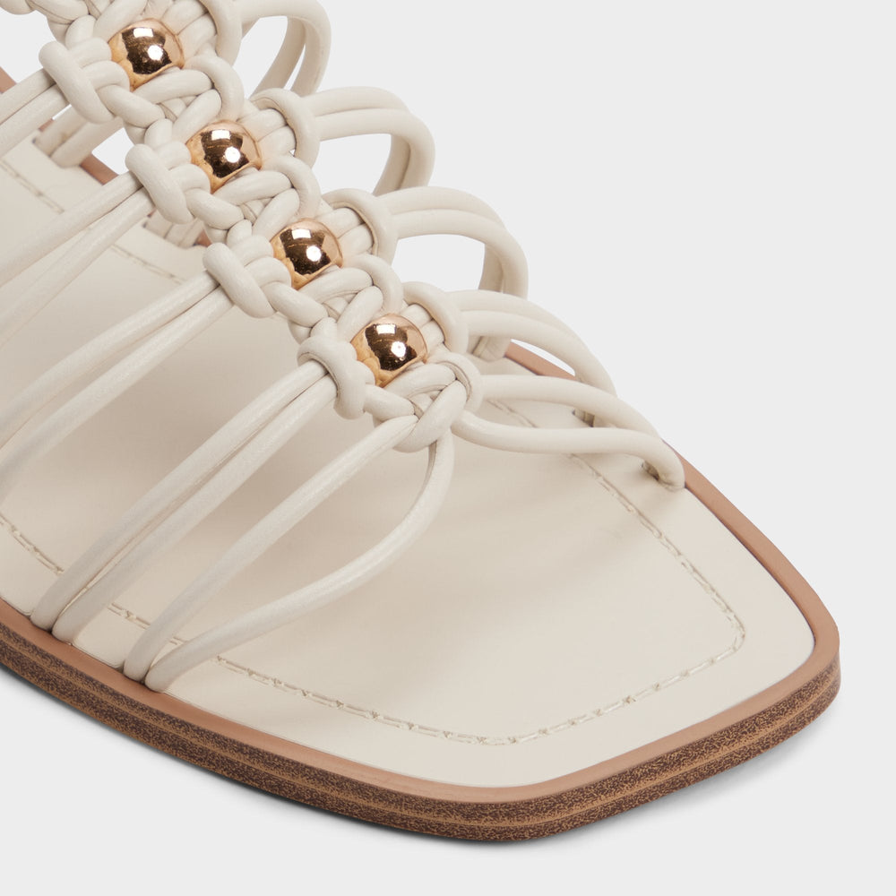 Unoma in White Bone - Strappy flat sandal